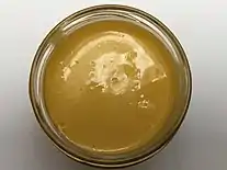 An open jar of Cheez Whiz