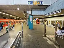 An S-Bahn and a Stadtbahn at the Chorweiler Station