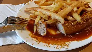 Currywurst with pommes frittes