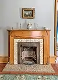 Fireplace in a bedroom at the Sam Bell Maxey House