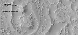Close-up of circular structure from previous image.  Streaks are also visible.
