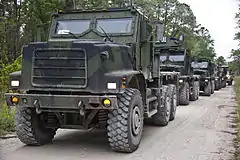 Designation for standard cargo 4.674 m wheelbase MTVRs is MK23 or MK25 (with winch). This MK23/MK25 is fitted with an armored cab.