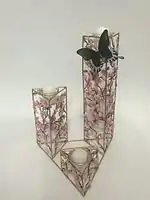 Candle holder inspired by the Philippine cherry blossom, balayong