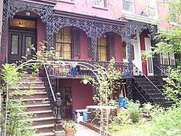 Italianate townhouses on East 18th Street (1853), with cast-iron verandas reminiscent of the French Quarter of New Orleans.