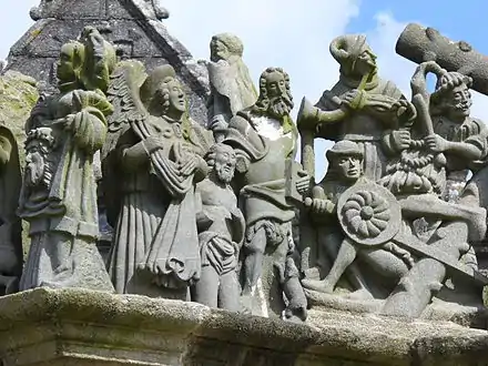 Part of the procession accompanying Jesus carrying the Cross to Golgotha. On the left we see St Veronica with her veil, then Jesus being baptized and then some of the soldiers accompanying Jesus.