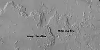 Lava flows on Olympus Mons with older and younger flows labeled, as seen by HiRISE under HiWish program