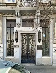 Art Deco door with spirals and sinuous lines, of the Mihai Zisman House (Calea Călărașilor no. 44), Bucharest, by architect Soru (1920)