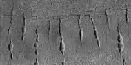 Close view of lines of pits,  as seen by HiRISE under HiWish program