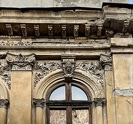 Complex pair of foliate heads above a window of Strada Justiției no. 46, Bucharest, Romania, unknown architect, c.1900