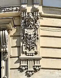 Beaux Arts mascaron in a small arabesque on the facade of Strada Clopotarii Vechi no. 4, Bucharest, Romania, unknown architect, 1899-1900