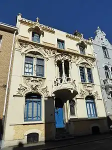 Mix of Art Nouveau and Gothic Revival – Rue Gustave-Lemaire no. 51, Dunkerque, France, with pointed arched-dormer windows and balcony loggia, unknown architect, decorated with sculptures by Maurice Ringot (1903–1910)