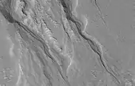 Close view of gullies, as seen by HiRISE under HiWish program