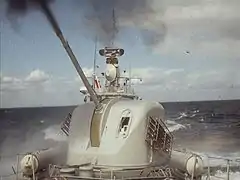 Bofors 57/70 Mark 1 firing from a Swedish Norrköping-class missile boat.