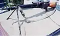 The Howa Type 64 DMR variant with a mounted riflescope and modified buttstock to accommodate a cheekrest