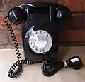 1972 741 wall mounted telephone in black.