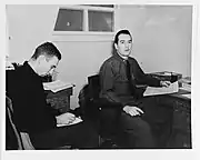 Y3c C. S. Foley (left) taking dictation from LCDR William P. Mack, NAS Adak, AK, 1943.