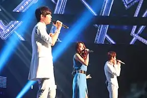 8Eight at the Cyworld Dream Music Festival in 2011From left to right: Lee Hyun, Joo Hee and Baek Chan