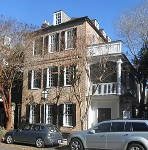 Thomas Legare House, ca 1759. An outstanding example of an early Georgian style Charleston single house well adapted to the narrow lot purchased in 1752. In 1816 an adjacent house was demolished to provide space for the walled garden and elegant Regency piazzas