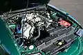 1999 SVT Cobra engine with a modified intake and battery.