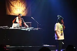 Carter (right) and 9th Wonder performing at Paid Dues in 2008