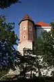 West wing of the castle and the gothic tower known as "Kurza Stopka" (Hen's Foot)