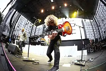 Adam Latiff performing with Puddle of Mudd in 2011