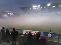 The stadium under heavy fog