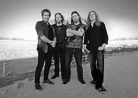 2011–2012 lineup. Left to right: Jay Schellen, Erik Norlander, John Payne, Bruce Bouillet. Photo provided by BIS Management.