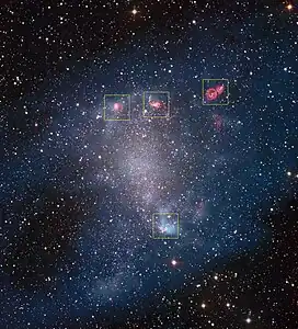 Composite image from data by 2.2-meter MPG/ESO and ALMA with star-forming regions identified.
