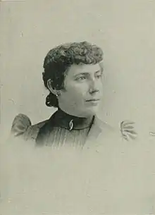 B&W profile photo of a middle-aged woman