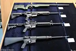 From top to bottom: a .338 Lapua Magnum Sako TRG-42, .308 Winchester MR308, .223 Remington Schmeisser GmbH AR15 M5 and a 9 mm AR-15 on display at the 2012 ARMS & Hunting exhibition.