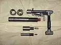 A very crude yet functional homemade gun made by a man in India; it is constructed mostly out of plumbing material