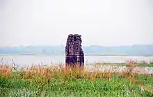 Old temple in front of a river