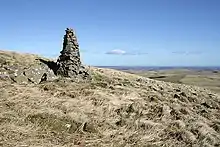 Picture of a cairn on Hogdon Law, to the north-west of Alnham.