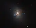 NGC 1222 contains three compact regions.