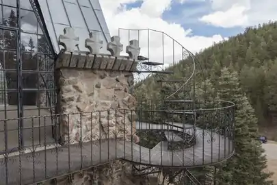 A rocky, twist and turn along a soaring tower of Bishop Castle.