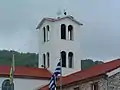 A stork on the top of the church of St. Procopius in Kladorrachi