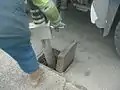 Sucking a drain gully out