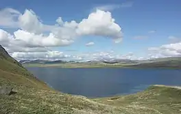 A large lake surrounded by hills