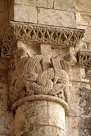 Capital retaining Corinthian form decorated with intertwined beasts derived from Irish manuscripts. Grande-Sauve Abbey, France