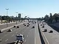 North Access freeway over National Route 9 (Argentina). The express lanes (left, all vehicles) and local lanes (right, cars and buses only) seen in the view towards the north.