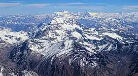 Mountain tops, with clouds shown.