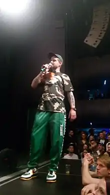 MC Kato performing with Chaozz in 2018
