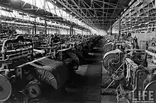 Black and white image of loom machinery