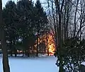 The house fully engulfed in flame, 20 Feb. 2019