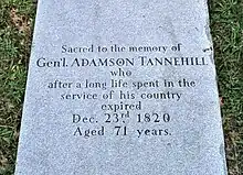 Photograph of tombstone. Engraved text reads "Sacred to the memory of / Gen'l Adamson Tannehill / who / after a long life spent in the / service of his country / expired / Dec. 23rd, 1820 / aged 71 years.”