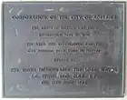 Plaque marking the opening of the redeveloped Adelaide Central Market Buildings by Lord Mayor James Irwin on 17 June 1966. Currently located at the Grote Street entrance.