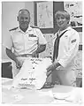 Adm Prins and SN Marlett celebrating one year of Bafflestir publications.