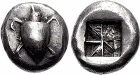 Image 55Silver stater of Aegina, 550–530 BC. Obv. Sea turtle with large pellets down centre. Rev. incuse square punch with eight sections. (from Coin)