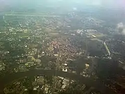 Aerial photograph mainly showing the area of Pak Kret District in the centre and lower right